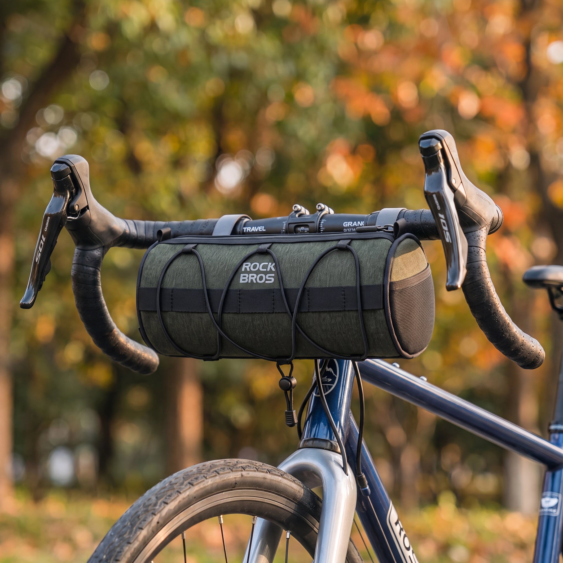 Sacoche de guidon vélo 2 L montée sur le cintre d'un vélo de route