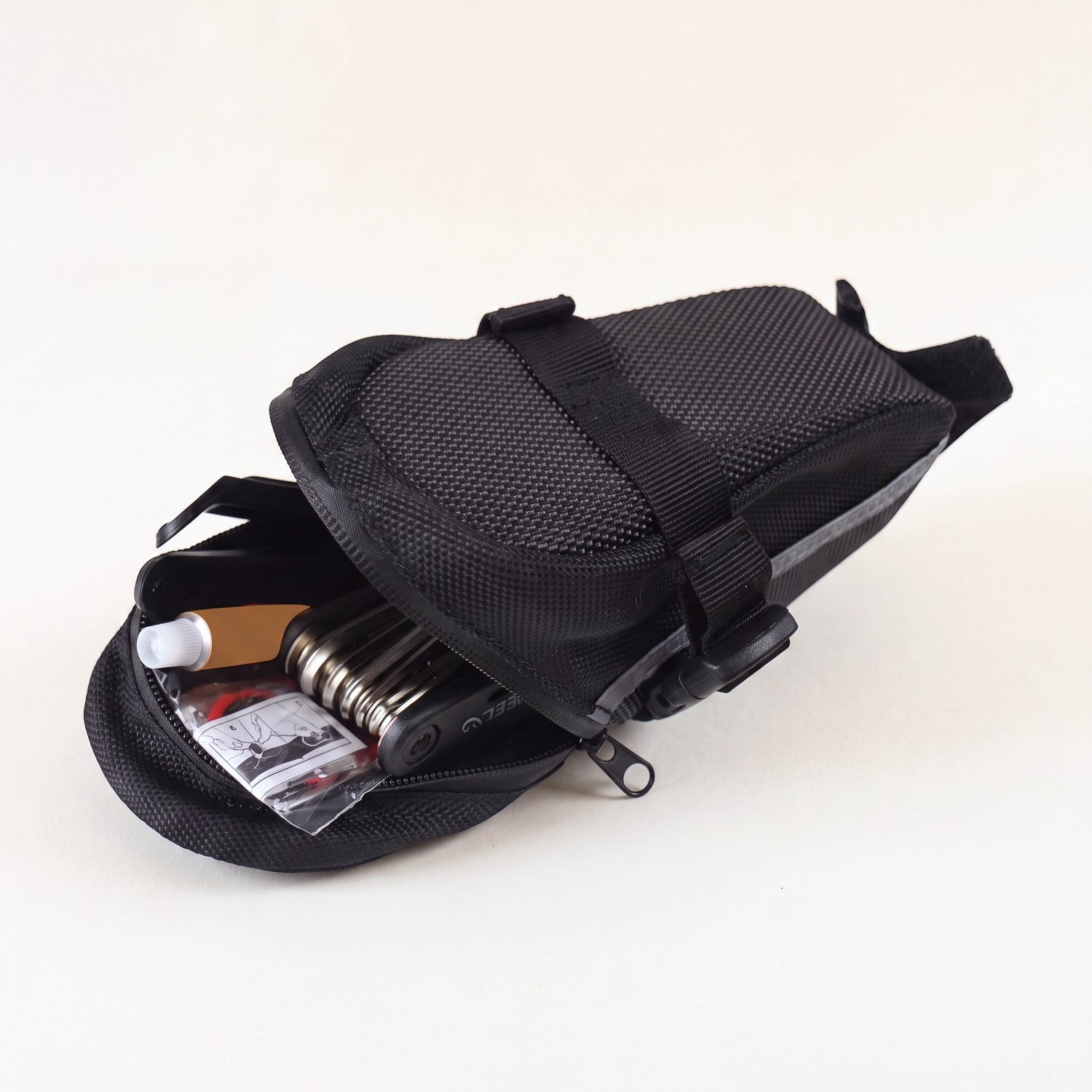 Compartiment zippé de la sacoche vélo sous-selle nylon 600D, 21 × 9,5 × 9 cm pour outils et accessoires (non inclus)